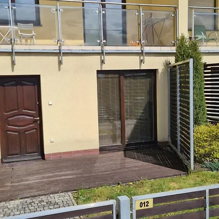 Apartamencik Z Ogrodkiem / With Garden * Sarbinowo